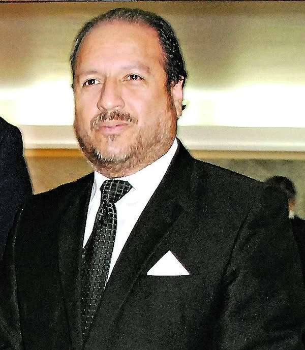 Retrato de Iván Torres La Torre publicado para anunciar su participación en el Congreso Internacional de Derecho Penal.
